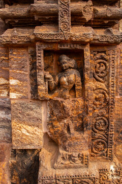 This erotic stone sculpture at the Konark Sun Temple depicts an intimate couple in close embrace, symbolizing fertility, human desire, and tantric philosophy in Odishan temple art.
