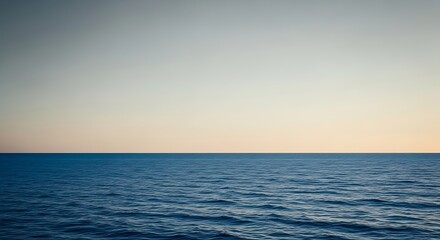 Minimalist view of calm ocean water and sky horizon