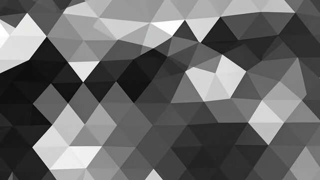 Abstract geometric background with a pattern of triangles in shades of gray, creating a modern design.