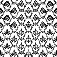 Classic black and white seamless damask pattern with elegant floral ornaments. Timeless vintage background ideal for wallpaper, textile, fabric, wrapping paper, packaging, and interior decor.
