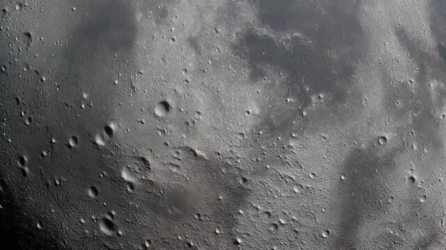 Detailed surface texture of the moon, craters, shadows, astronomy stock video