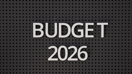 Close-up shot of words Budget 2026 spelled out with white letters on a gray pegboard