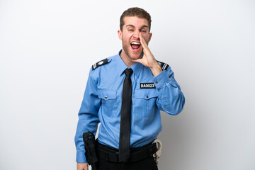 Fototapeta premium Young police caucasian man isolated on white background shouting with mouth wide open