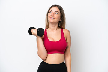 Fototapeta premium Young sport Rumanian woman making weightlifting isolated on white background thinking an idea while looking up