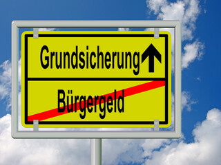 Place name sign with the inscription &ldquo;Basic income support and citizen's income&rdquo;