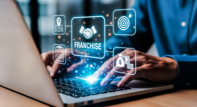 Business person working on laptop with glowing digital franchise icons and handshake symbol representing partnership and business growth concept
