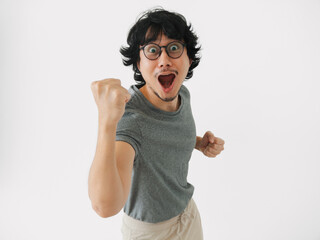 A Young Man Filled with Excitement and Happiness Celebrating His Significant Victory