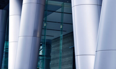 Naklejka premium Detailed view of sleek steel and glass facade