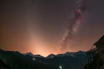 time lapse of clouds over mountains