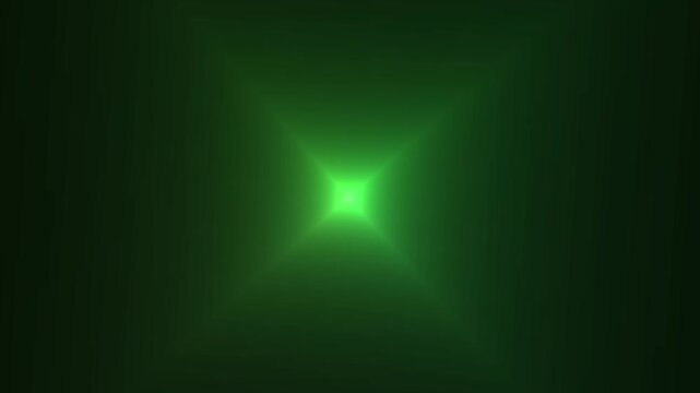 A bright green light shines in the dark, creating a sense of mystery and intrigue in this captivating video.
