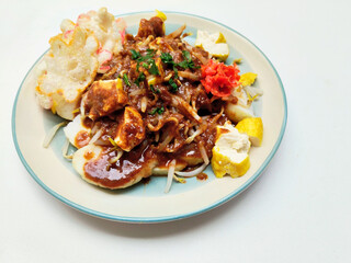 Spicy Peanut Sauce Tofu and Rice Cake