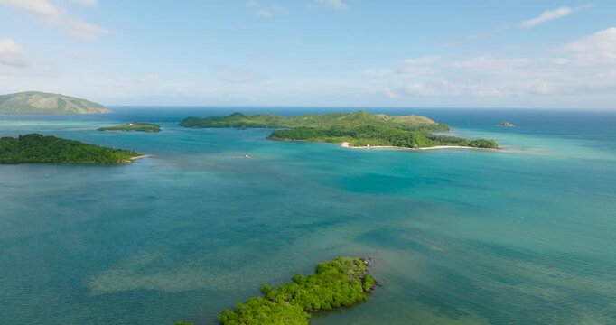 Manamoc and Cabangajan Island with turquoise sea water. Santa Fe, Tablas, Romblon. Philippines.
