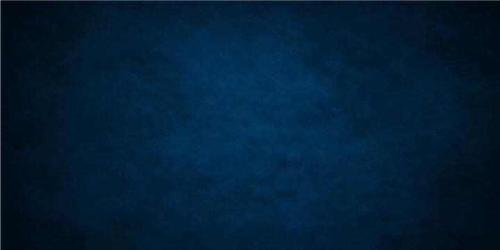 A dark blue vintage grunge background features a textured paper pattern with aged paint and rough material design to create an artistic old wall wallpaper backdrop