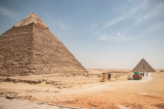 Rachef's great pyramid on the left side and on the right side in the background is Chufu's pyramid with opened entrance and small horses transport.