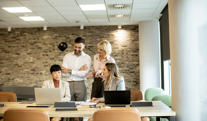 Team collaboration in a modern office space during a meeting to discuss project ideas