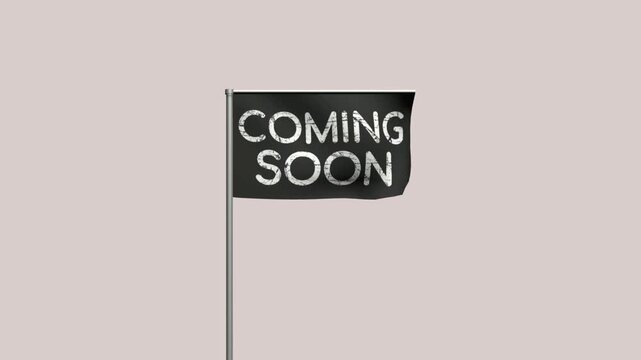 Black flag with white distressed text reading coming soon on a metal pole for marketing and product launch announcements