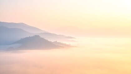 Soft pastel hues envelop rolling hills and valleys, creating a serene landscape at dawn