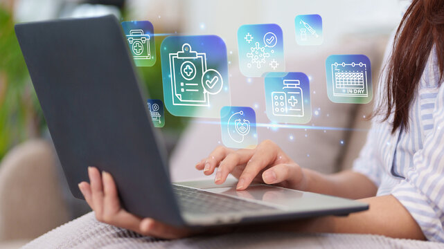 Woman use laptop access digital health insurance records with online medical icons for healthcare management and virus protection telehealth medical technology coverage