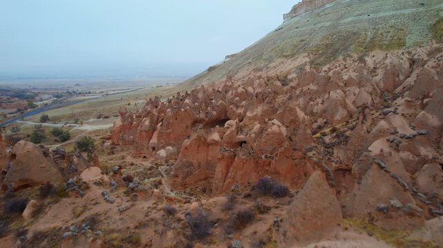 Aerial view Ancient city with cave houses in tuff stones of Cappadocia, Goreme national park of Turkey.