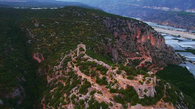 Ruins Myra Ancient City in Demre Antalya, flagpole with Turkish flag Aerial Top view..