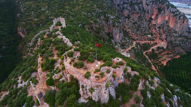 Ruins Myra Ancient City in Demre Antalya, flagpole with Turkish flag Aerial Top view..