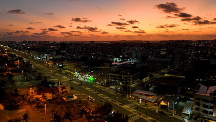 Fototapeta premium Sunset Aracaju Skyline In Aracaju Sergipe Brazil. Bird Eye View Of A Amazing Coastal Beach In The Summer Holiday. Building Landscape Skyscrapers Stunning. Industry Urban Corporate. Aracaju Sergipe.
