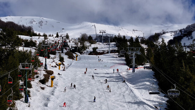 Cerro Catedral In Bariloche Rio Negro Argentina. Ski Lift Passing Over Frozen Mountain In Winter Landscape. Snowing Day Lake Swiss Alps Snow Mountain. Snowing Day Nature. Bariloche Rio Negro.