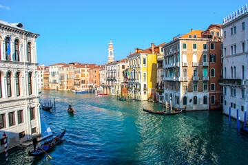 Fototapeta premium Gondolas and historic buildings along a Venetian canal