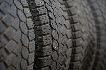 A close-up of a stack of winter tires