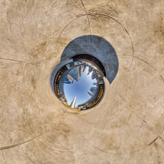 Fototapeta premium sphere inside overlooking multi-storey buildings of skyscrapers of residential complex, urban development. Transformation of spherical 360 panorama in abstract aerial view.