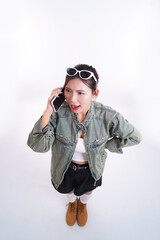 Frustration Unleashed: A Young Woman's Phone Call: The image captures a young woman expressing frustration while on the phone.