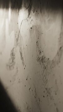 Dynamic Shifting Light Creates Abstract Patterns On Textured Wall Surface Footage