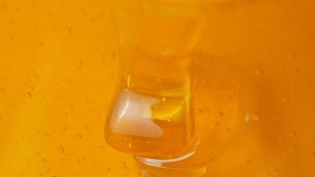 Macro texture of fresh bee honey, honey cooking background slow motion