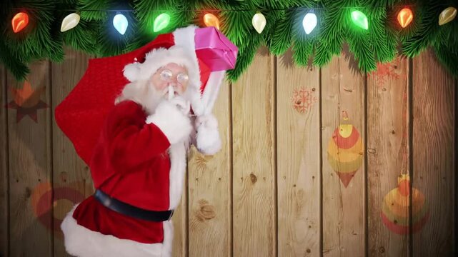 Santa carrying gift sack under Christmas lights and pine branches animation