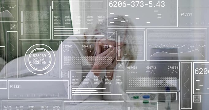 Mature woman receiving phone call and examining pill bottle checking medication label for health