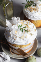 Traditional Easter cakes and painted eggs in white colors .Easter Kulich	