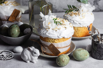 Traditional Easter cakes and painted eggs in white colors .Easter Kulich	