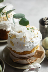 Traditional Easter cakes and painted eggs in white colors .Easter Kulich	