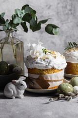 Traditional Easter cakes and painted eggs in white colors .Easter Kulich	