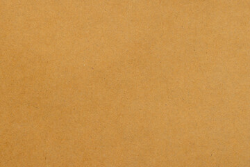 Fototapeta premium Brown Kraft Paper Texture Background for Creative Design,Macro,A high-resolution, close-up shot of a natural brown kraft paper texture with subtle fiber details, ideal for rustic backgrounds,