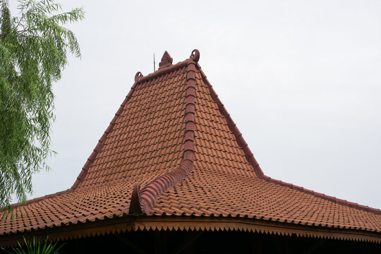 Traditional Javanese Joglo House Roof with Terracotta Tiles