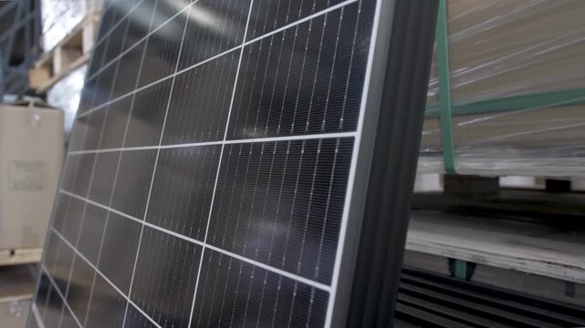Macro Texture of Polycrystalline Silicon Solar Cell showing Photovoltaic Wafer Grid and Sun Flare Reflection for Clean Energy Technology