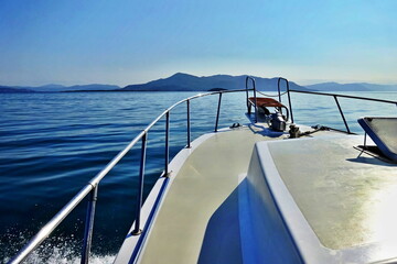 Greece - view from the boat of the island Megali Strongyli and the island Monolia