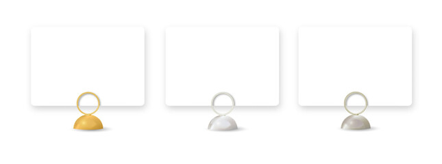 Realistic 3D silver clip displaying blank template on desktop. Perfect mockup for cafe menu, office reminder, business badge, or tabletop presentation flyer.