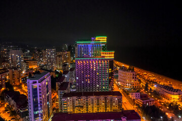 Obraz premium Aerial night view of Batumi skyline and Technological Tower