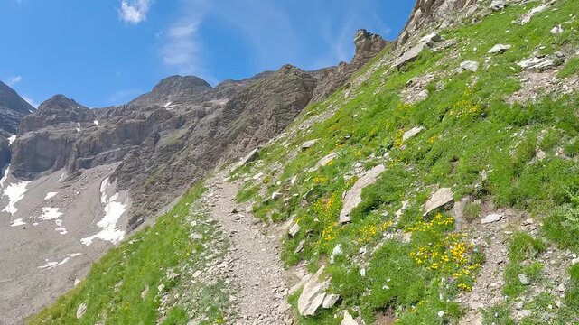 Hiking to Rifugio Ernesto Tazzetti in Graian Alps in Italy during beautiful summer day