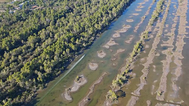 Aerial view of Divjake Karavasta area in Albania showing wetland biotope with large bird colonies, lagoons, and protected natural habitat