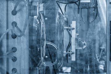 Plastic Disk Parts Mass Production from Injection Molding Machine in Light Blue Industrial Scene