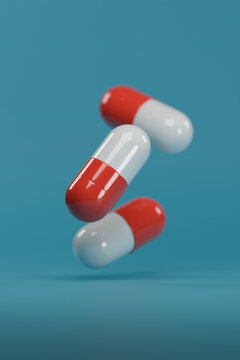 Pills red an white on blue background. 3d illustration.