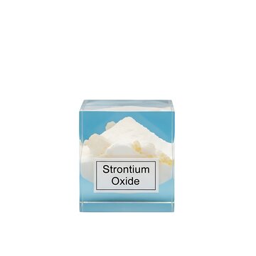 A small box of Strontium Oxide powder on a plain background
